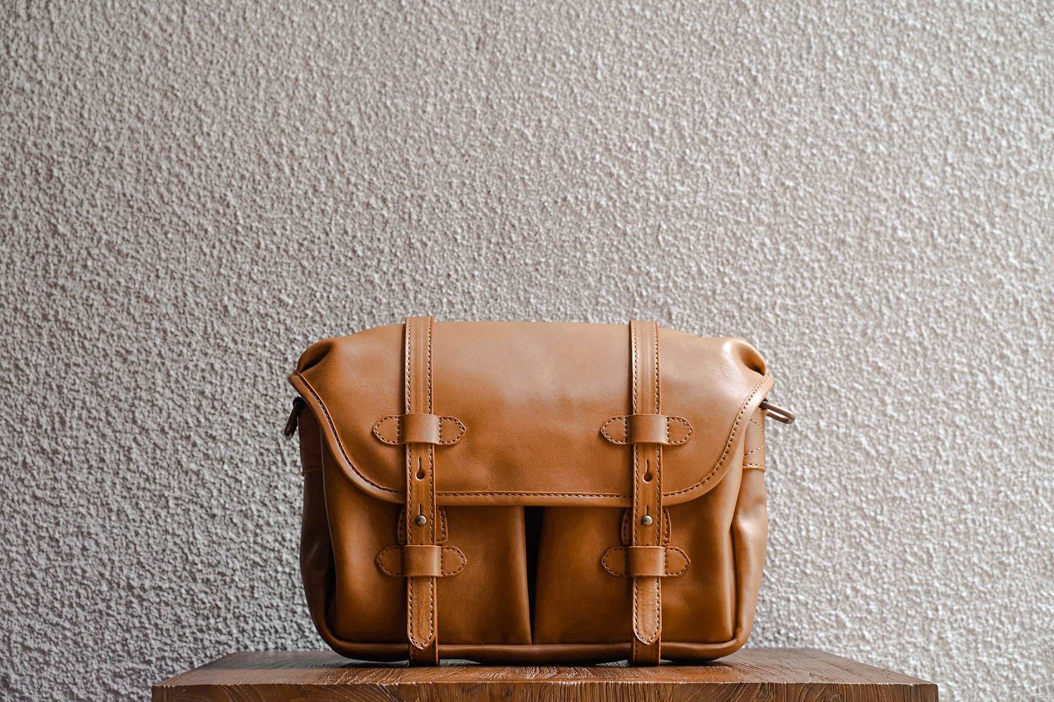 Our bags are made from as few leather pieces as possible. Fewer seams makes for a stronger bag.