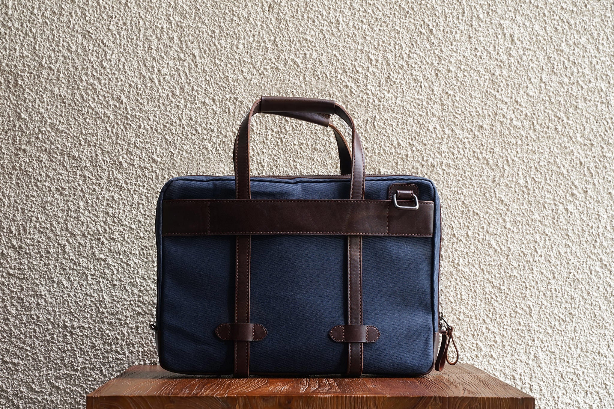 Traveling made easy with the luggage handle slot at the back.