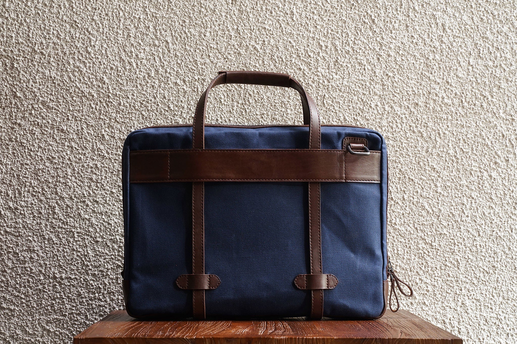 Traveling made easy with the luggage handle slot at the back.