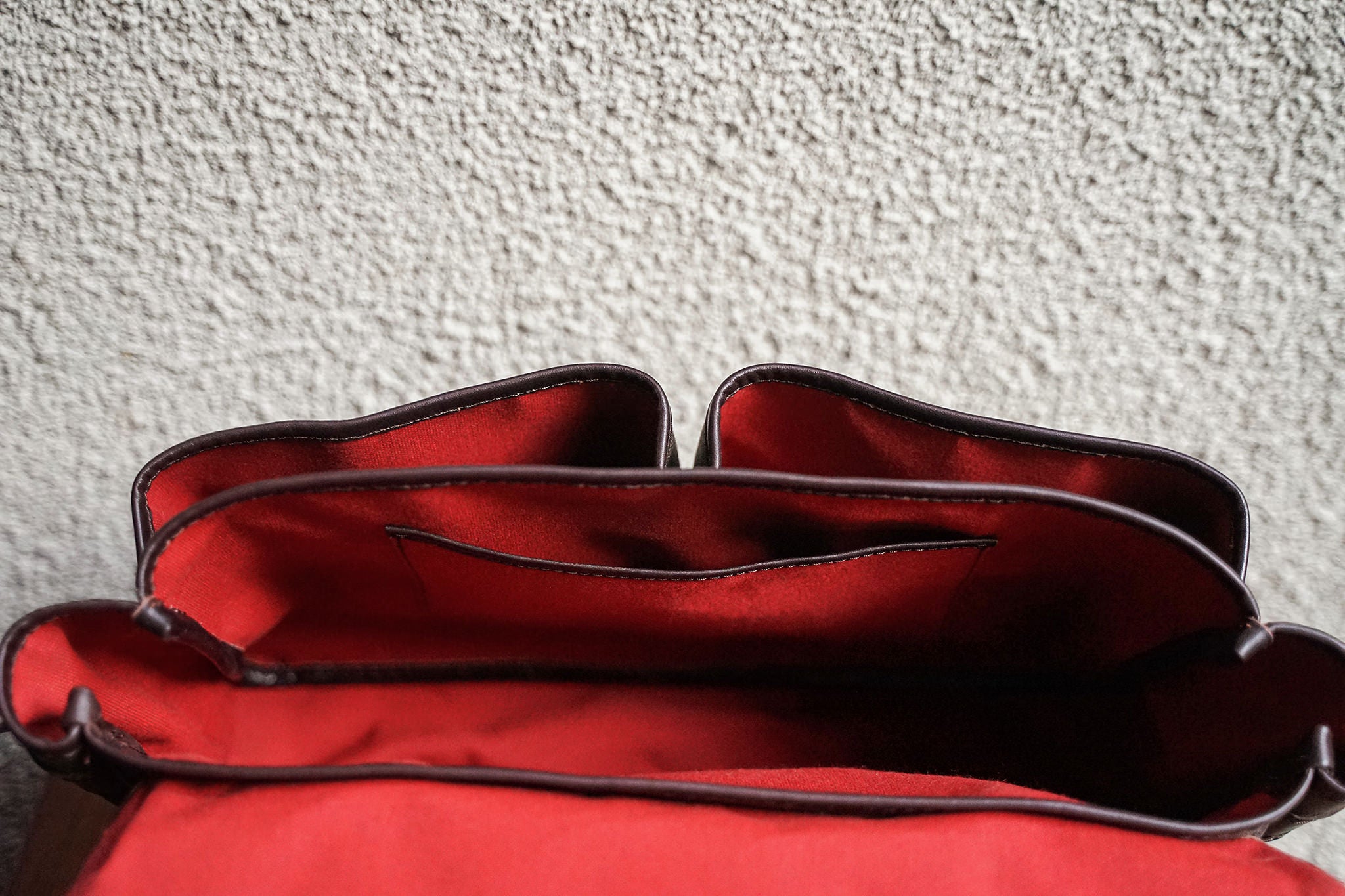 A view of the inside of the F.C. while empty. Note that all inside facing accessories such as rivets are covered, to avoid scratching the bag's contents.